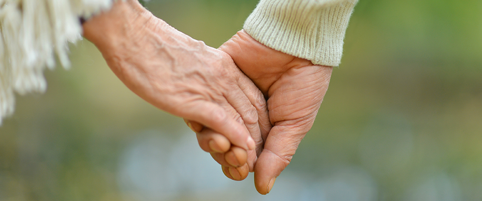 Older couple holding hands reminds Joyce how the outlook on marriage and an ideal partner changes as you grow older and mature.