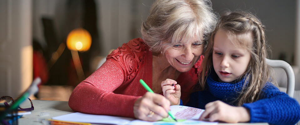 Grandmother teaching her grandchild