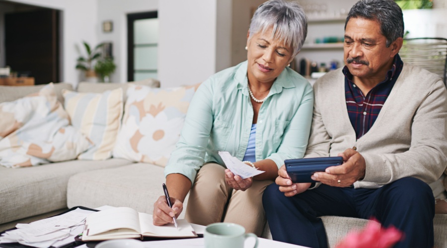 Older couple doing taxes together