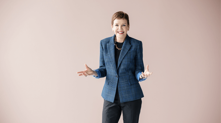 Pattie-Lovett-Reid-smiling-in-a-blue-blazer