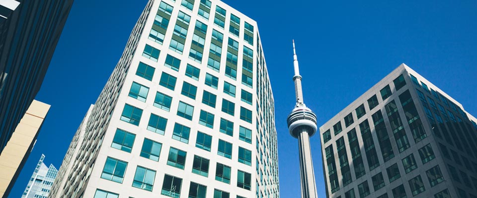 Apartments in tall buildings are downsized housing options considered by Canadian seniors.