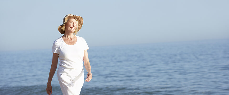 Canadian Senior woman enjoying her sea-side vacation.