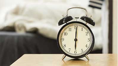 A clock on the table to remind older Canadian above the age of 55, to sleep at least 7 to 9 hours to live a healthy lifestyle.