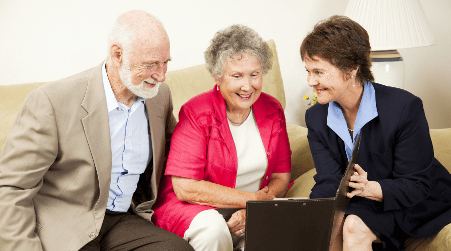 elderly-couple-reviewing-their-income-with-a-female-financial-advisor