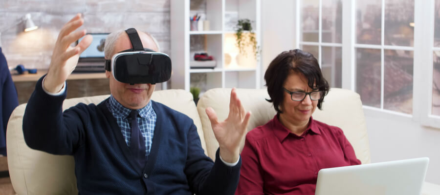 elderly-couple-using-modern-technology