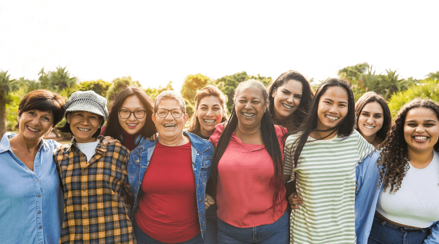 group-of-multigenerational-women-smiling-and-laughing