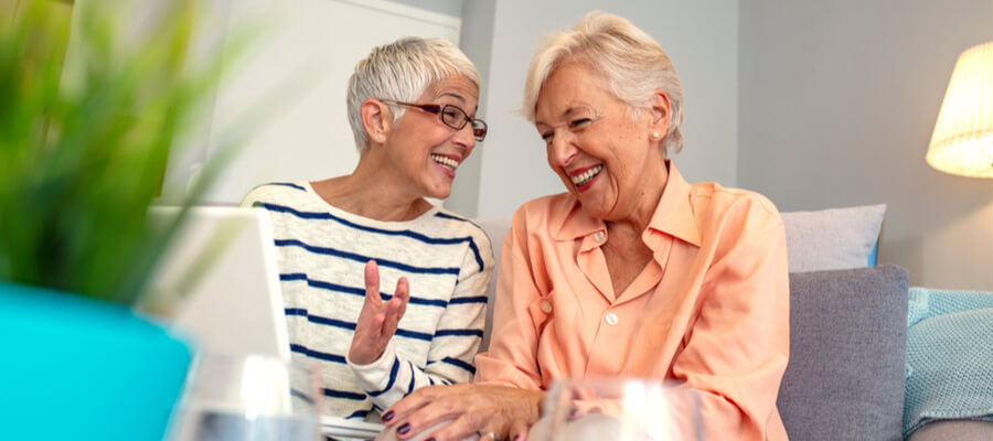 joyful-senior-women-having-conversation