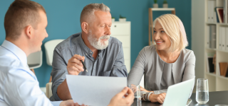 older couple getting advice from a friend