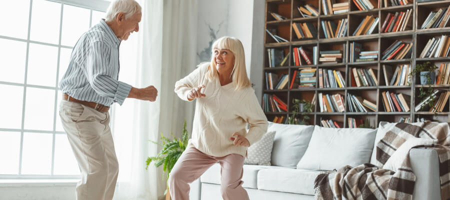 older-couple-dancing-at-home-remaining-active