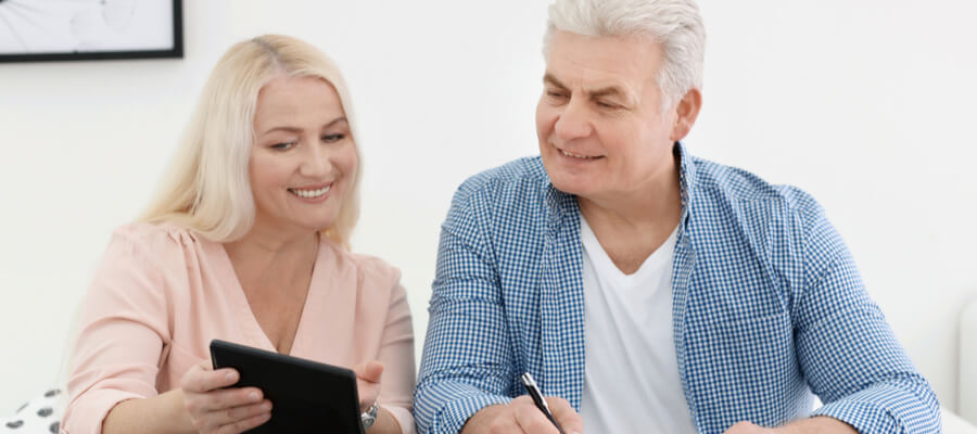 senior-couple-looking-over-pension-payment