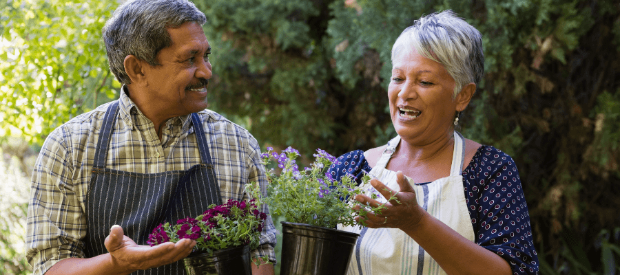 older-couple-planting-flowers